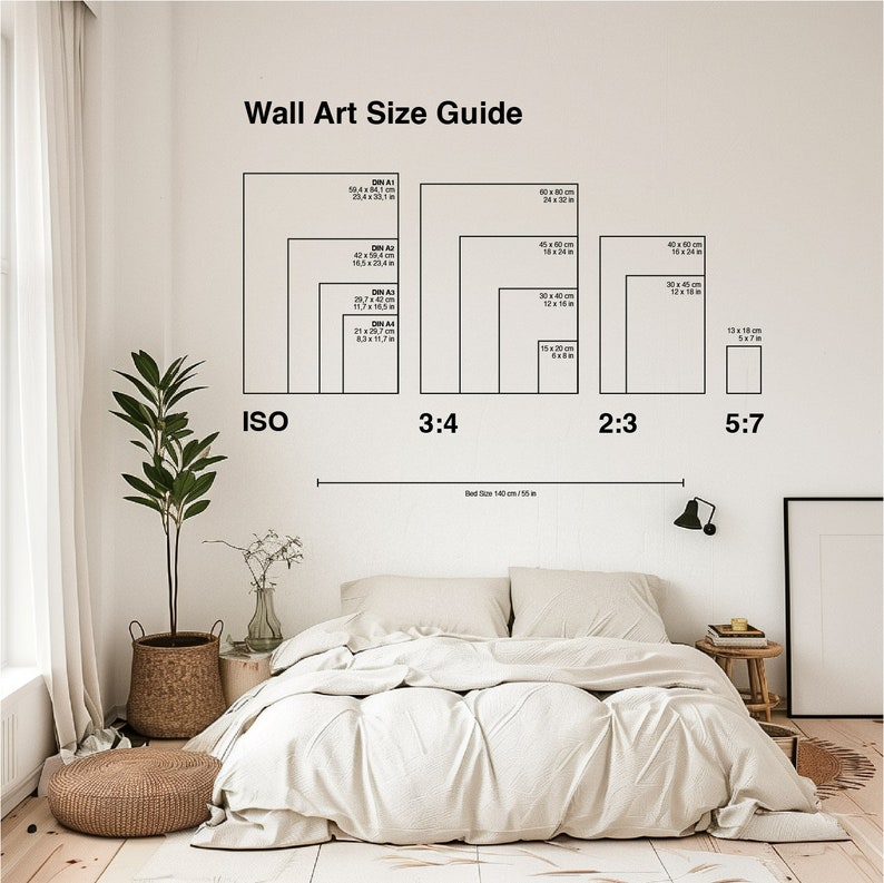 a white bed sitting under a window next to a white wall