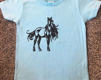 Camiseta de caballo azul para niño: camiseta con silueta del oeste