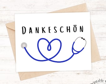 May include: A white card with the German word "Dankeschön" in black lettering, and a blue stethoscope forming a heart shape. The card is on a brown envelope, with a "Printable Card Digital Download" graphic.