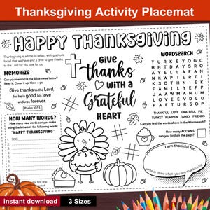 May include: Thanksgiving activity placemat with a black and white design. Features a word search, fill-in-the-blank, and drawing prompts. Includes the phrases "Happy Thanksgiving", "Give thanks with a grateful heart", and "I am thankful for..."