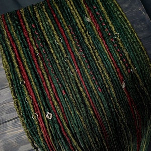 mix of textures, dreadlocks, several shades of green + burgundy