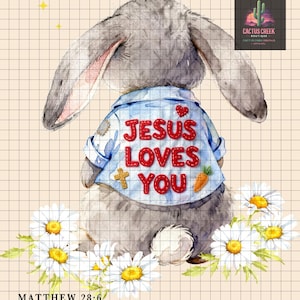 May include: A watercolor illustration of a gray bunny wearing a blue jacket with the words "JESUS LOVES YOU" in red. The bunny is surrounded by white daisies with yellow centers. The text "MATTHEW 28:6" is at the bottom.
