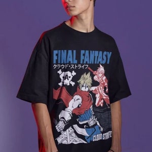May include: Black t-shirt with a graphic print of characters from the video game Final Fantasy VII. The text "FINAL FANTASY" and "CLOUD STRIFE" are printed on the shirt. The Japanese text "クラウド・ストライフ" is also printed on the shirt.