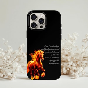 May include: Black phone case with a graphic of a horse engulfed in flames. The case includes the text: "Stop Overthinking and finally run toward your soul aligned path with courage clarity & Unstoppable momentum."