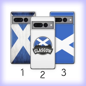 May include: Three phone cases with different designs. The first case features a distressed blue and white Scottish flag. The second case is white with a sticker of a Scottish flag and the word "GLASGOW". The third case features a solid blue background with a white Scottish flag.
