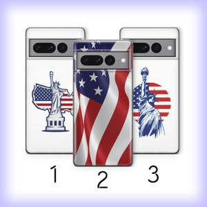 May include: Three phone cases with different designs featuring the Statue of Liberty and the American flag. The first case has a map of the United States with the Statue of Liberty in the center. The second case has a red, white, and blue American flag design. The third case has a silhouette of the Statue of Liberty with the American flag in the background.