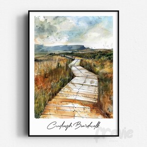 May include: A watercolor painting of a wooden boardwalk winding through a grassy field with a mountain range in the distance. The sky is cloudy and the boardwalk is surrounded by tall grass. The text "Cushlagh Boardwalk" is written at the bottom of the painting.