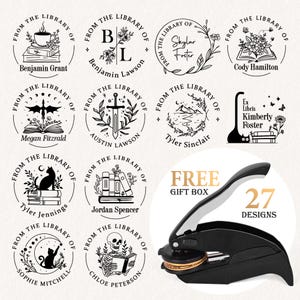 May include: A black embosser with a silver handle and a gold-colored die, accompanied by 12 circular designs with the text "From The Library Of" and various illustrations. The image also includes the text "FREE GIFT BOX" and "27 DESIGNS".