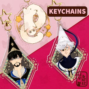 Può includere: Un set di tre tazze in ceramica con finitura opaca e macchiettata. Le tazze sono nei toni del crema, grigio chiaro e grigio scuro. Ogni tazza ha un design semplice e minimalista.