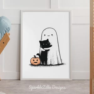 Halloween ghost and cat cozy digital print framed in living room.