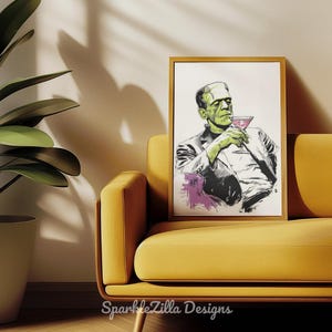 Frankenstein sipping martini wall art framed in teal living room with yellow chair, spooky retro Halloween printable.