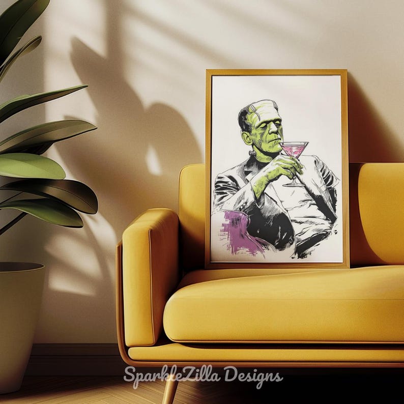 Frankenstein sipping martini wall art framed in teal living room with yellow chair, spooky retro Halloween printable.