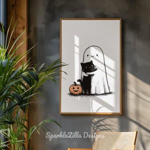 Minimalist cozy ghost hugging cat printable wall art in natural sunlight.