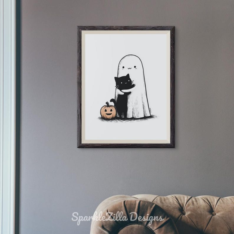 Cute ghost hugging cat printable Halloween wall art above sofa.