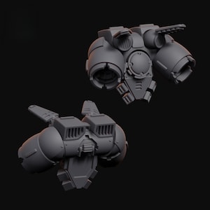 May include: Two grey, unpainted miniature jetpack components featuring dual thruster nozzles, top-mounted stabiliser fins, and a central circular housing. These mechanical backpack accessories display intricate panel lines and ventilation grilles.