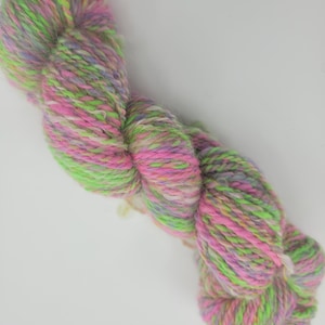 Handspun, hand dyed green, pink, yellow, and purple yarn, Merino wool, Kid Mohair (Angora goat), bamboo, worsted weight, 2-ply yarn