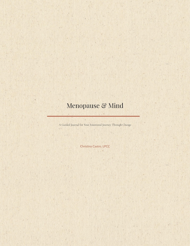 May include: A cream-colored journal cover with a textured surface. The title Menopause & Mind is printed in black, followed by a thin horizontal red line and the subtitle A Guided Journal for Your Emotional Journey Through Change. Christina Castro, LPCC is printed at the bottom.