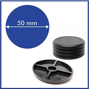 May include: Four black round furniture pads, each measuring 50 mm in diameter, with a fifth pad featuring a cross-shaped design.