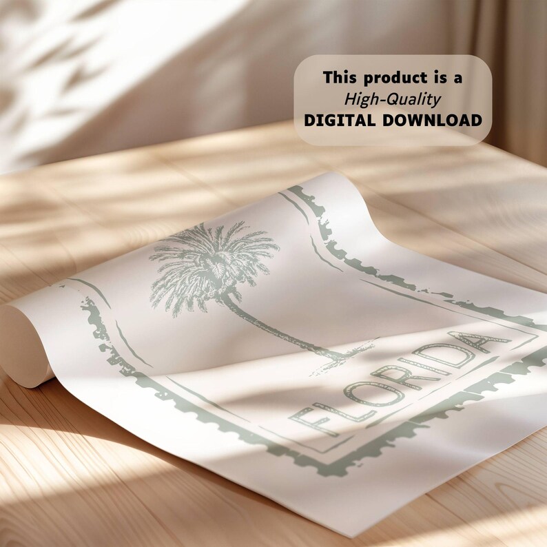 May include: Rolled-up print featuring a palm tree illustration in a muted green color. The word "FLORIDA" is printed in a rectangular frame. The text "This product is a High-Quality DIGITAL DOWNLOAD" is also visible.