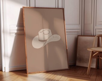 Könnte beinhalten: Ein braunes Poster mit einer weißen Cowboyhut-Illustration. Der Hut hat ein braunes Band und ein weißes Blumendesign.