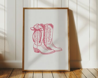 Könnte beinhalten: Ein Paar rosa Cowboystiefel mit einer Schleife auf dem Oberteil eines Stiefels. Die Stiefel sind im Vintage-Stil gezeichnet.