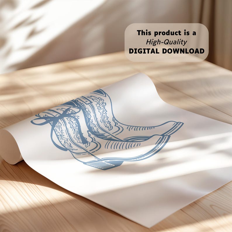 May include: A white sheet of paper featuring a blue line art illustration of a pair of cowboy boots with decorative stitching. The text "This product is a High-Quality DIGITAL DOWNLOAD" is printed in black in the upper right corner of the image.