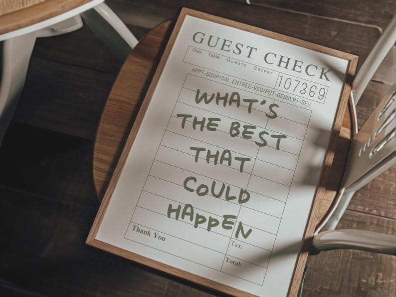 May include: A guest check with the text "WHAT'S THE BEST THAT COULD HAPPEN" in a wooden frame. The check has a serial number and lines for appetizers, soup, salad, entree, vegetables, dessert, and beverages.