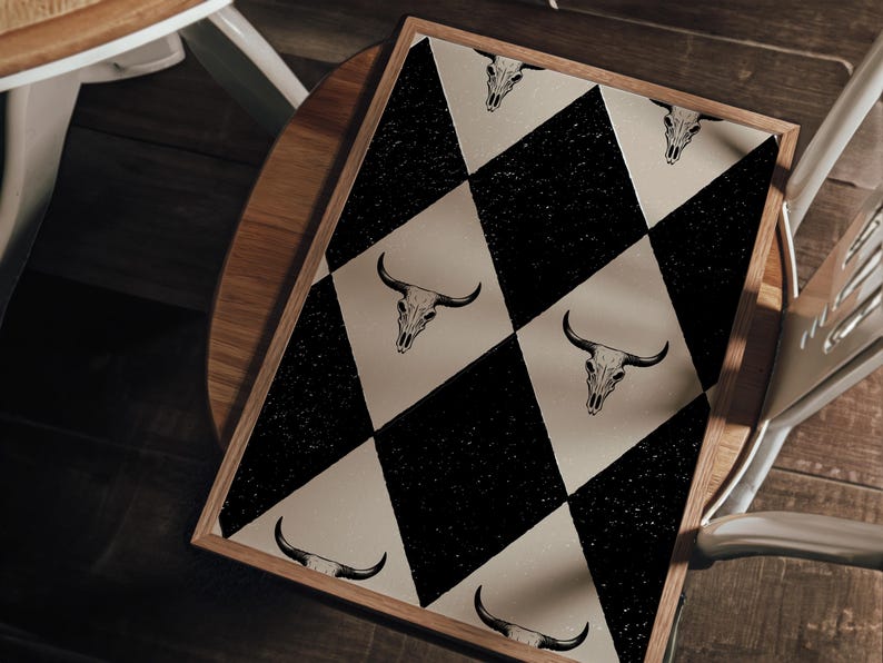 May include: A black and white checkered rug with a cow skull design. The rug has a distressed look and is made of a soft, durable material.