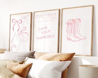 May include: Three framed prints with pink text and illustrations. The left print features pink bows, the middle print says "Guest Check" and "Long Live Cowgirls", and the right print features pink cowboy boots.