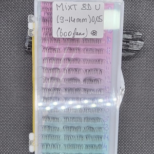 May include: A clear plastic box containing a set of black eyelash extensions. The box has a pink label with the text "MiXT 8D U (8-14mm) 0.05 (600 fans)".