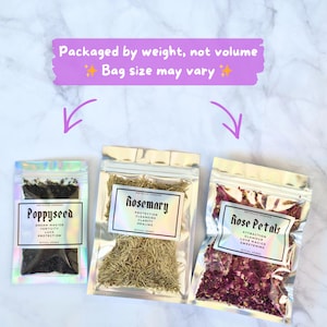 May include: Three clear, resealable bags filled with herbs. The bags are labelled "Poppyseed", "Rosemary", and "Rose Petals". The text "Packaged by weight, not volume" and "Bag size may vary" is above the bags.