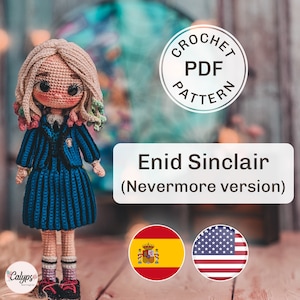 May include: Crochet pattern PDF for Enid Sinclair from the Netflix show Wednesday. The pattern is available in English and Spanish. The image shows a crocheted doll wearing a blue dress and a blue jacket.