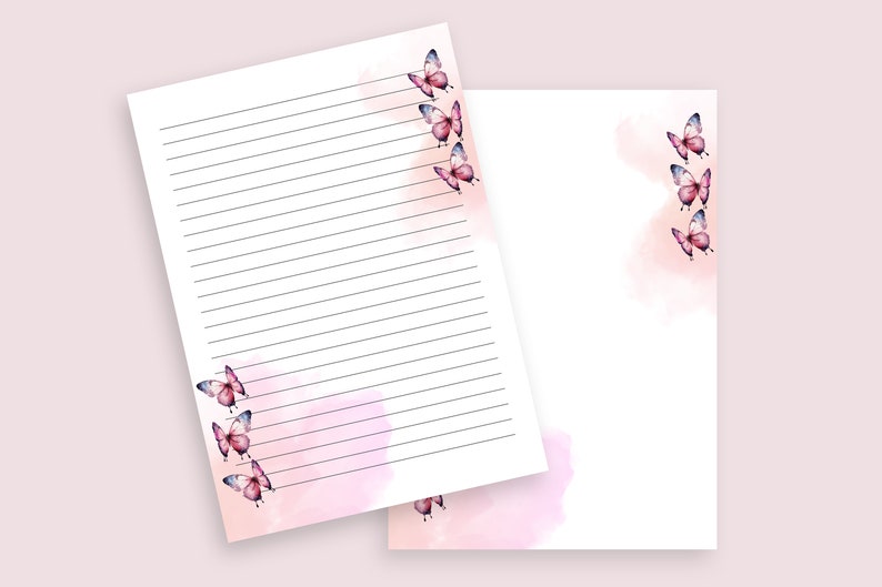 May include: Two sheets of lined paper with pink watercolour butterflies. The paper has a pink watercolour background with a faded effect.