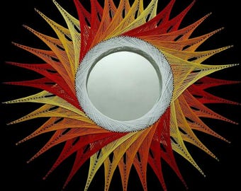 Sztuka sznurkowa w kształcie słońca w stylu nowoczesnym