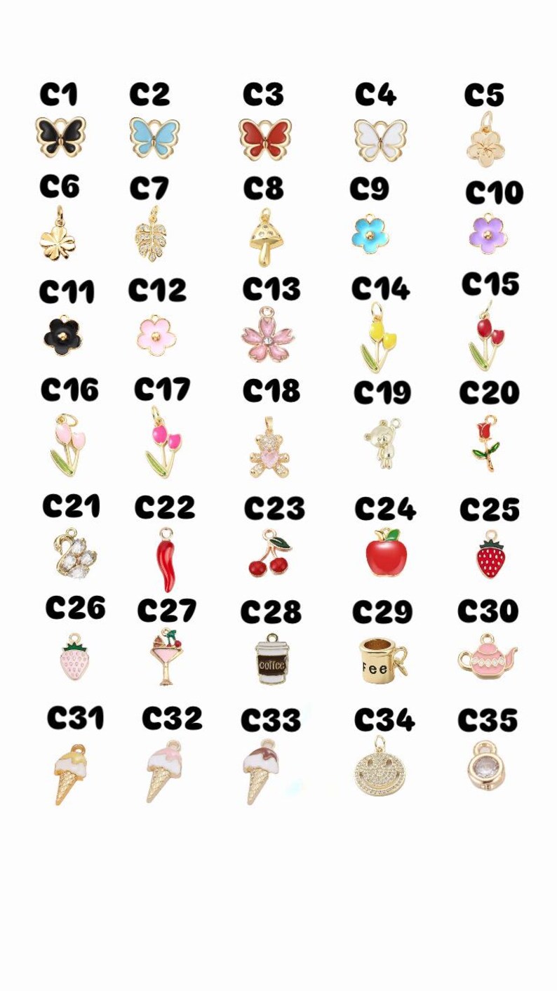 May include: A selection of gold-coloured charms in various shapes, including butterflies, flowers, fruits, and food items. Each charm is labelled with a number from C1 to C35, offering a diverse selection for jewellery making or crafting.