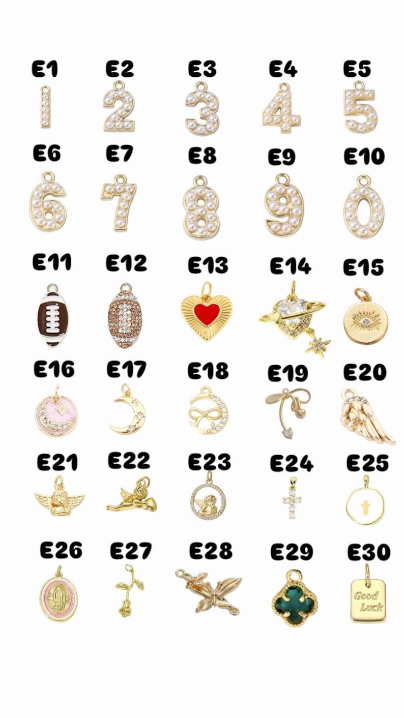 May include: A selection of gold-coloured charms, each with a unique design. Charms include numbers, a football, a heart, a planet, an eye, a moon, a bow, angels, a cross, a clover, and a "Good Luck" tag. The charms are labelled E1 to E30.