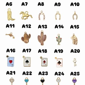 May include: A selection of gold-coloured charms, featuring cowboy boots, hats, horseshoes, cacti, playing cards, and keys. Each charm has a small loop for attaching to jewellery. The charms are labelled A1 to A30.