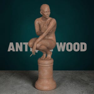 Rebellious Thinker statue featuring a nude feminine figure crouched on a round pedestal, holding a cigarette and making a bold hand gesture, with a calm, defiant expression and contemporary art styling.