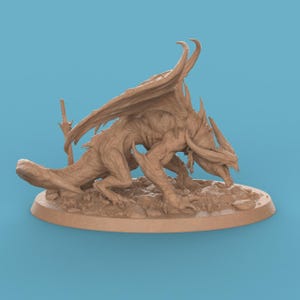 May include: A detailed, tan-colored dragon figurine with large wings, horns, and a long tail. The dragon is posed on a rocky base, with a sword behind it. The figurine is set against a light blue background.