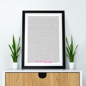 May include: A black framed print with a white background and a large amount of black text. The text is a full script of the movie "The Princess Bride". The bottom of the print has the text "inconceivable!" in pink.