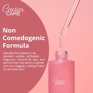 May include: A pink bottle with a dropper, labeled "Caviar CARE" and the text "Non Comedogenic Formula". The bottle is on a pink background and the text describes the product as being paraben-, sulfate-, phthalate-, fragrance-, mineral oil-, dye-, and alcohol-free.
