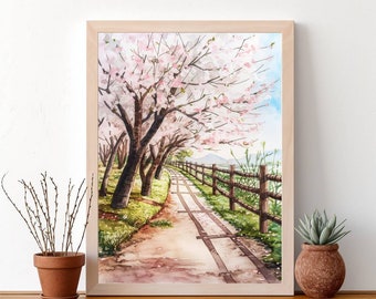 May include: Watercolor painting of a path lined with cherry blossom trees in full bloom. The path leads to a wooden fence and a distant mountain range. The painting is framed in a light wood frame.