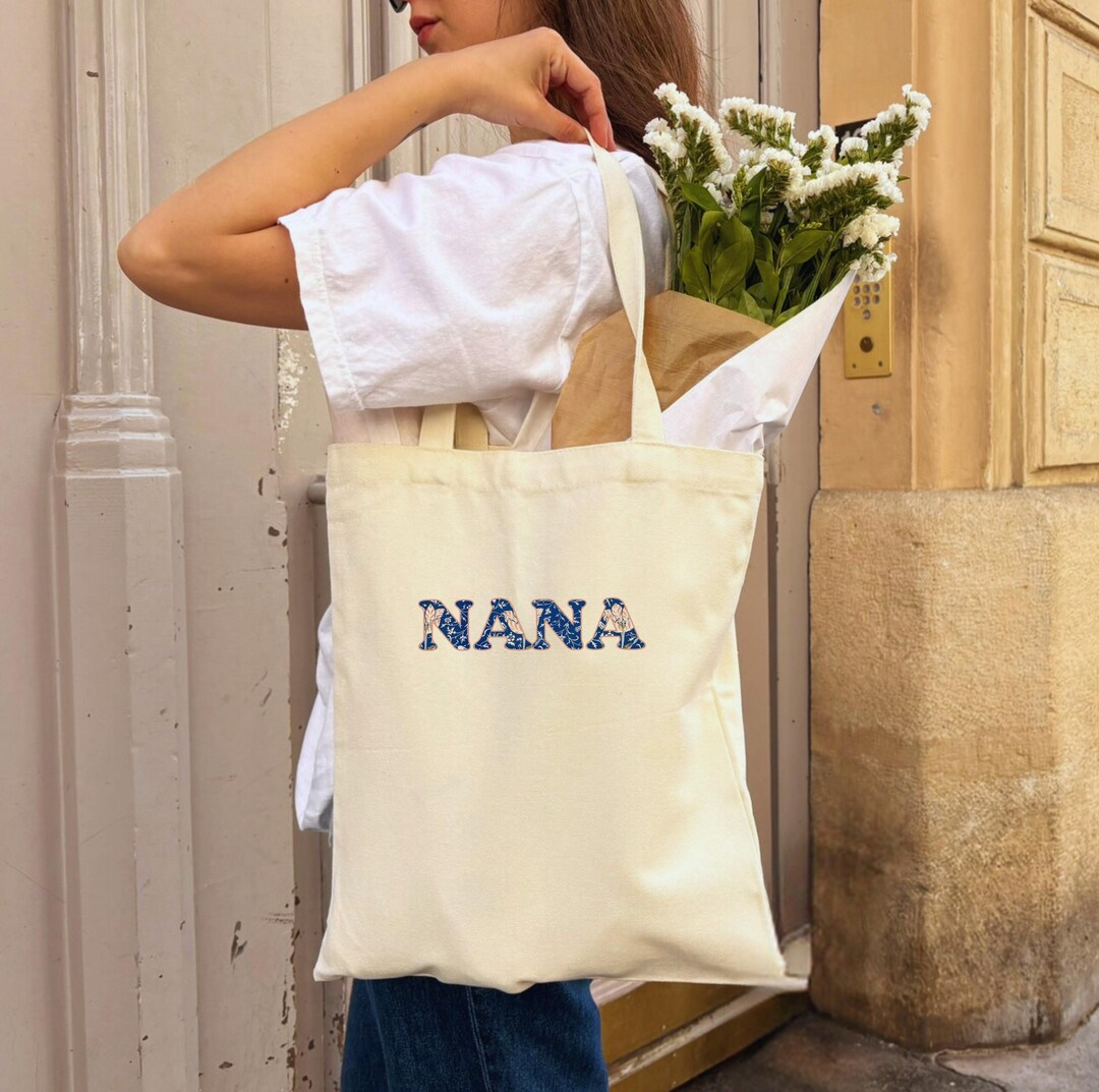 Navy Lotus Ginni Bag – Timeless Festive Keepsake