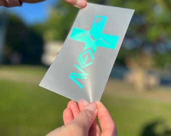 Calcomanía holográfica de cruz cristiana: Dios es más grande