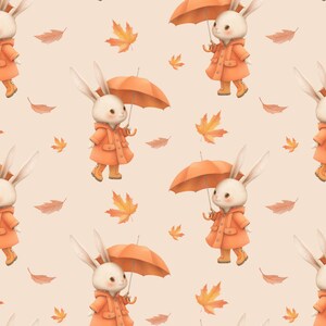 May include: A seamless pattern featuring white rabbits wearing orange raincoats and holding orange umbrellas. The background is a light peach color with scattered orange maple leaves.