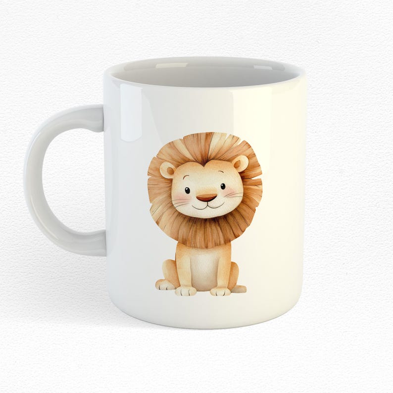 May include: White ceramic mug with a cartoon illustration of a brown lion with a light brown mane. The lion is sitting with its paws in front of it and has a friendly expression.