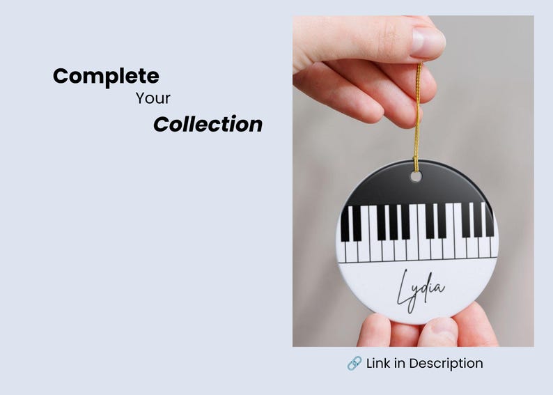 May include: A round, flat, white and black ceramic ornament featuring a piano keyboard graphic and the name Lydia in black script. The ornament hangs from a gold string and includes the text Complete Your Collection and Link in Description.