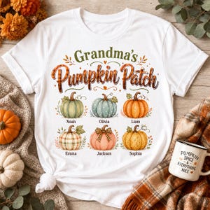 May include: A white short-sleeve t-shirt featuring the text Grandma's Pumpkin Patch in orange and green. Below the text are six illustrated pumpkins in various colors and patterns, each labeled with the names Noah, Olivia, Liam, Emma, Jackson, and Sophia.