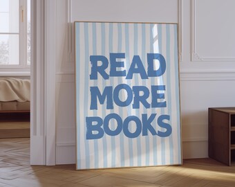 May include: A blue and white striped poster with the text "READ MORE BOOKS" in blue.