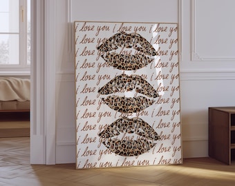 May include: A white canvas print with three leopard print lips and the words "I love you" repeated in a cursive font.